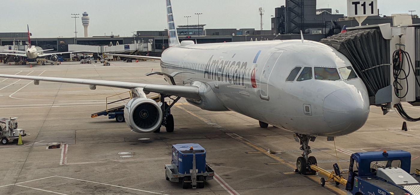 Image: American Airlines plane at airport gate. (photo by Eric Bowman)