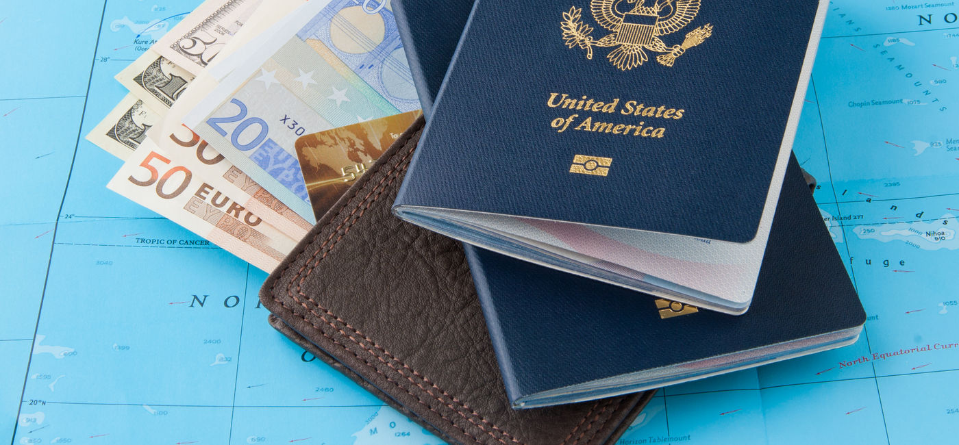 Image: Passports, wallet and money. (photo via volgariver / Getty Images)