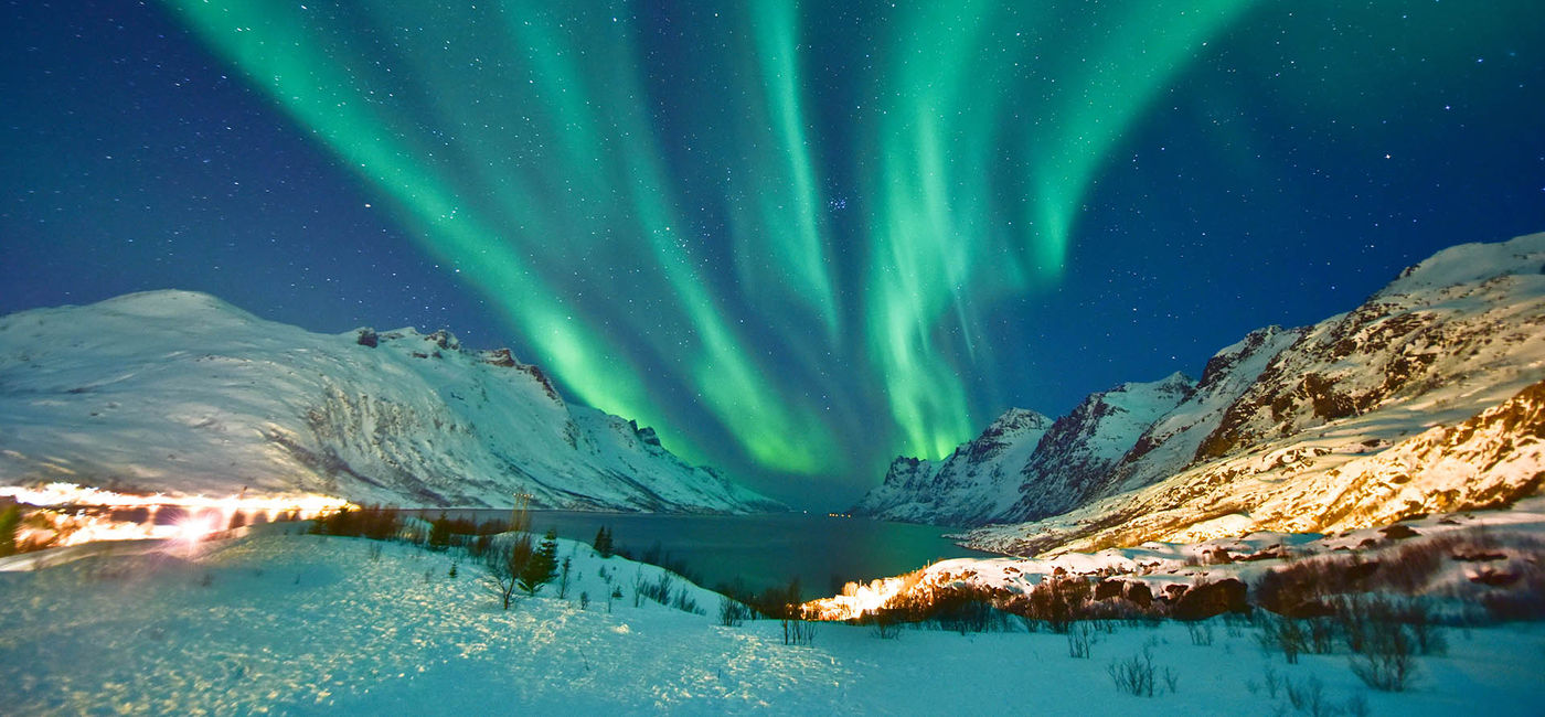 Image: PHOTO: Northern Lights over Tromso, Norway. (photo courtesy MuYeeTing/iStock/Getty Images Plus)