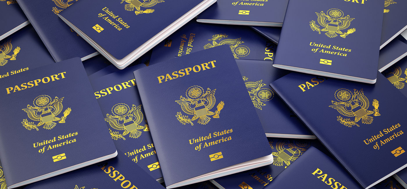 Image: Pile of U.S. passport documents. (photo via iStock/Getty Images Plus/Bet_Noire)